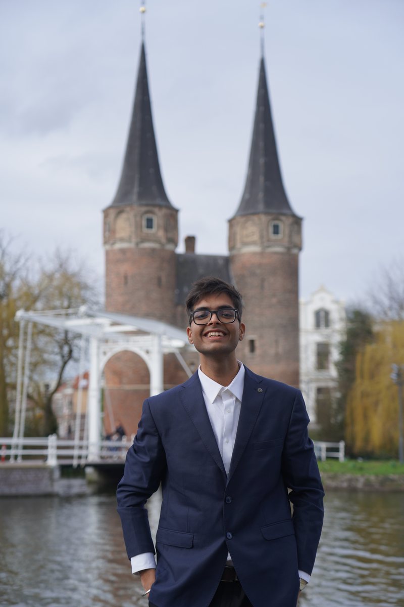 Karthik Swaminathan in front of the Oostpoort, Delft